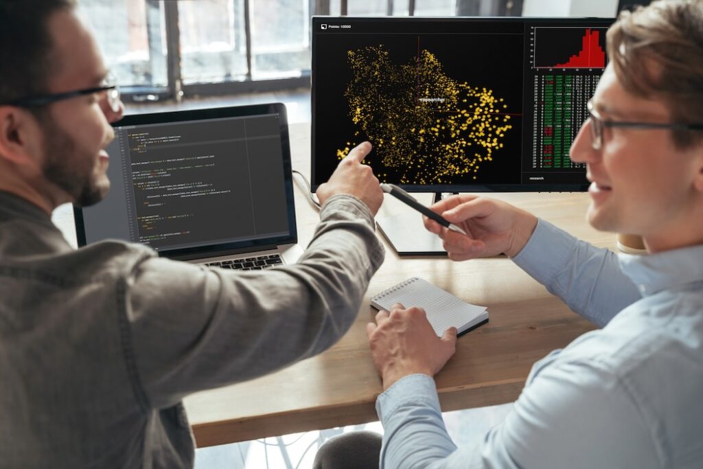 two machine learning specialists descanting about new project | BetaKit two machine learning specialists descanting about new project